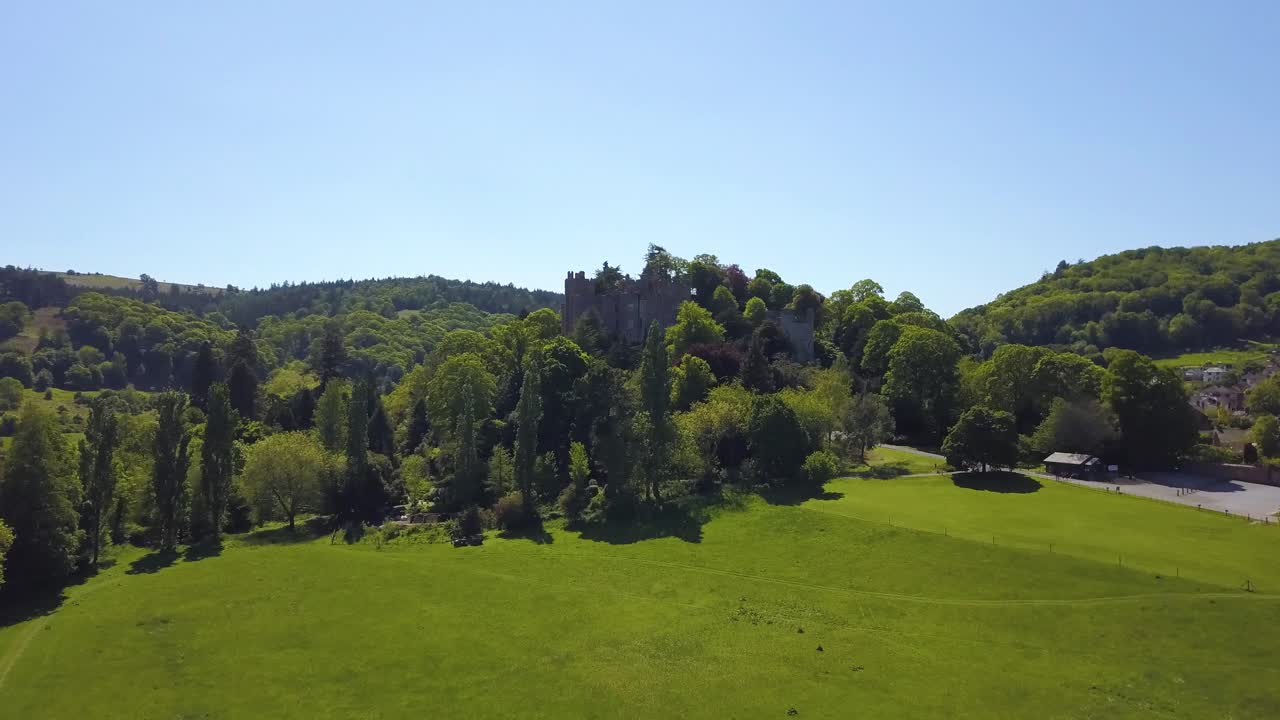 Aerial view of the Dunster castle and the surrounding gardens, Somerset, England.