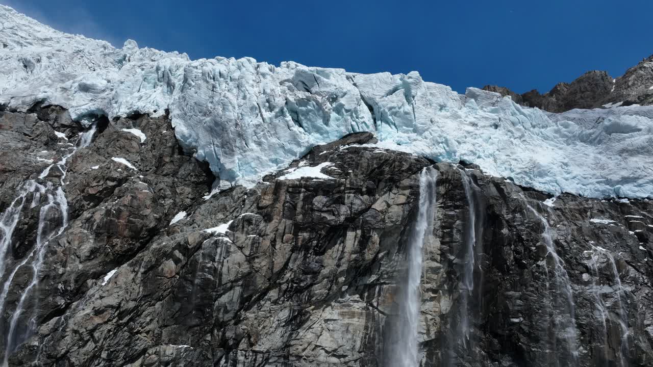 Aerial Upward Drone Closeup Shot of Fellaria's Top part Glacier and its Waterfalls - Valmalenco - Sondrio