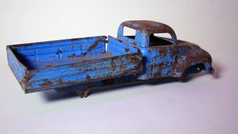 old and rusty vintage soviet era metal tinplate toy truck without wheels