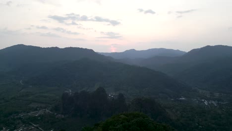 aerial view of a vast mountain landscape at sunset