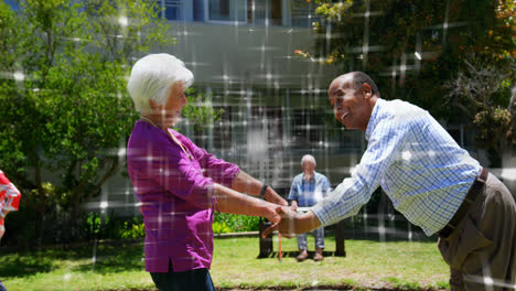 animación de puntos de luz sobre diversos amigos mayores bailando