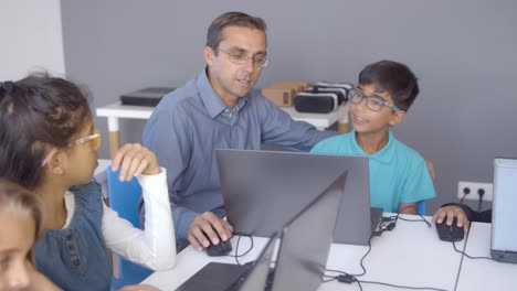 School-boy-sneezing-during-class