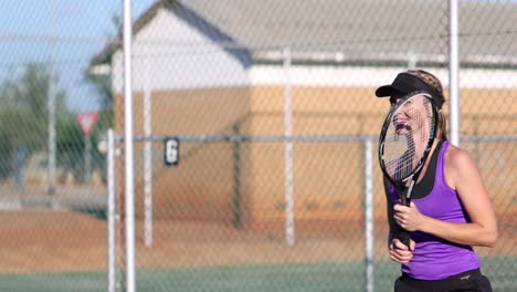 close up footage of a female tennis player playing tennis on a tennis court