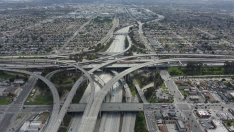 AERIAL:-Spectacular-Judge-Pregerson-Interchange-showing-multiple-Roads,-Bridges,-Highway-with-little-car-traffic-in-Los-Angeles,-California-on-Beautiful-Sunny-Day