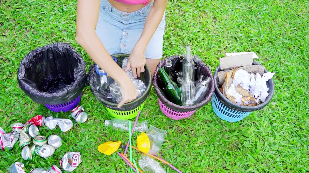 Woman Recycling Different Types of Waste