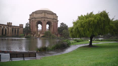 park and lake of the palace of fine arts in a rainy day