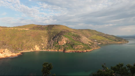 A-beautiful-summers-day-overlooking-the-Knysna-HEads-from-a-viewpoint-with-boats-coming-in-and-out-of-the-Indian-Ocean