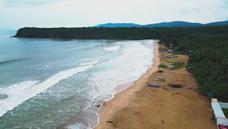 aerial view of a beautiful tropical beach with fishing boats