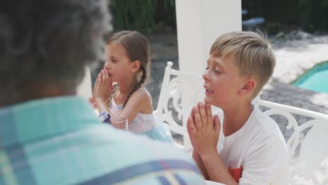 happy family eating together at table