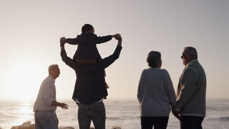 big family, holding hands or grandparents at beach