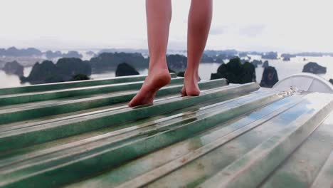 thai girl looking the thailand islands landscape from a viewpoint during vacations, travel concept