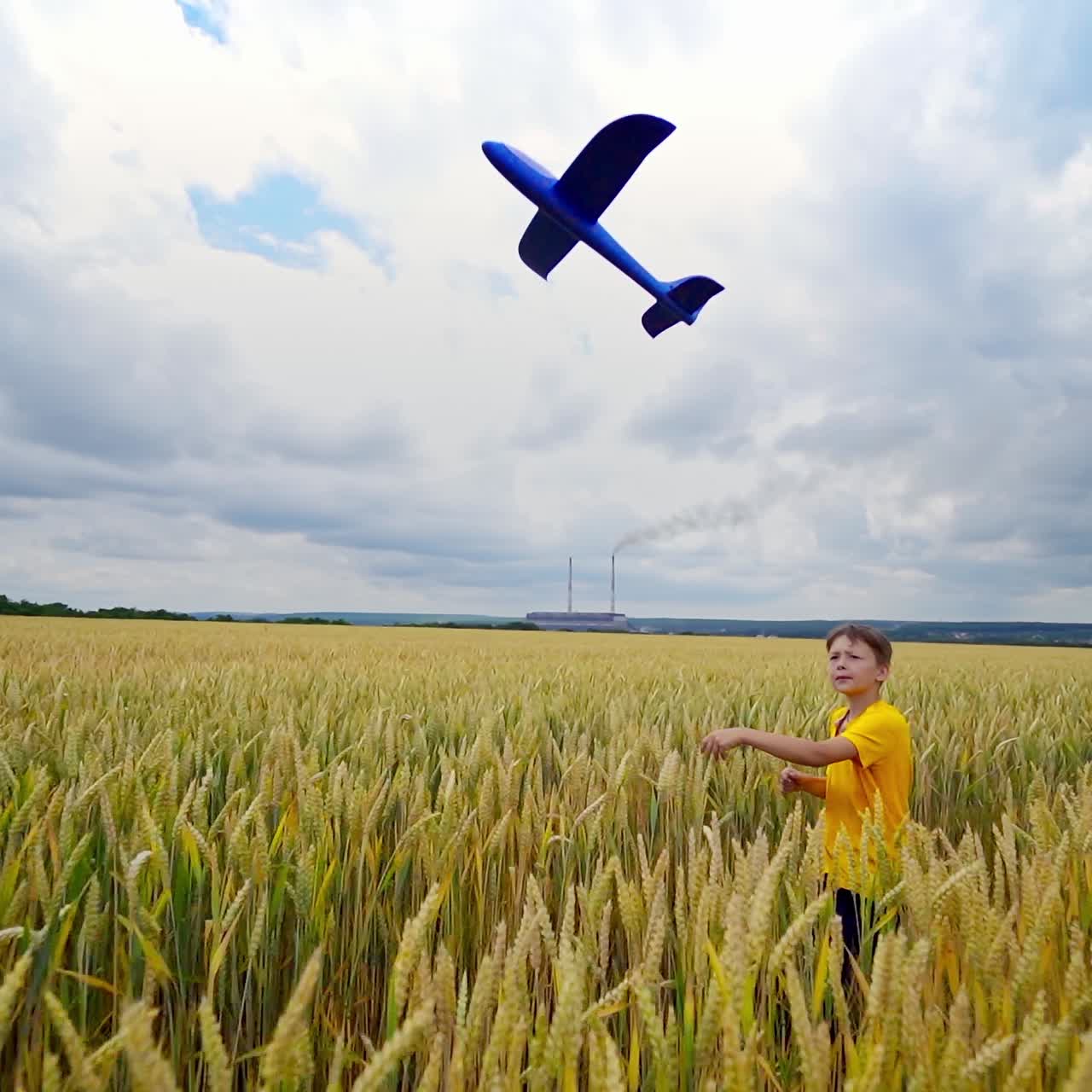 Running boy with toy plane