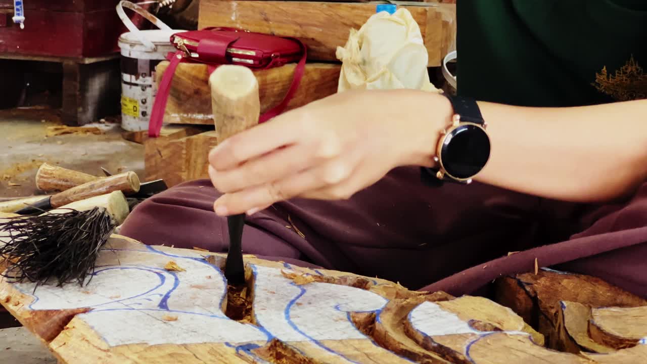 carving the wood in a closeup in 4k