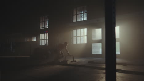 Man working out in industrial gym