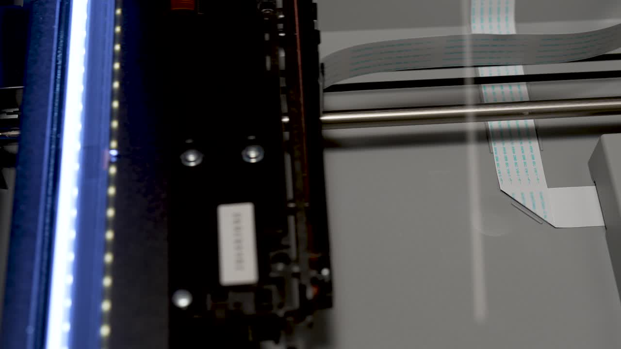 The inside of a document scanner in operation, slow motion