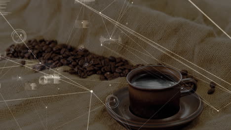 brown ceramic coffee cup sitting on burlap cloth, showing digital network nodes and bar charts