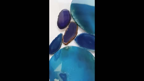 agate stones blue and purple set on white background