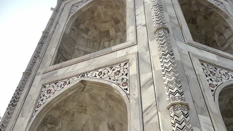 intricate carvings at the marble mausoleum of the taj mahal in agra, uttar pradesh, india. low angle shot