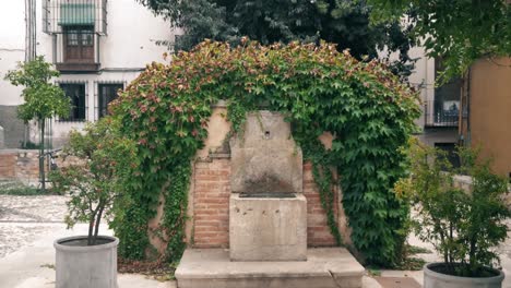 dolly movement with a pretty spanish fountain in the center