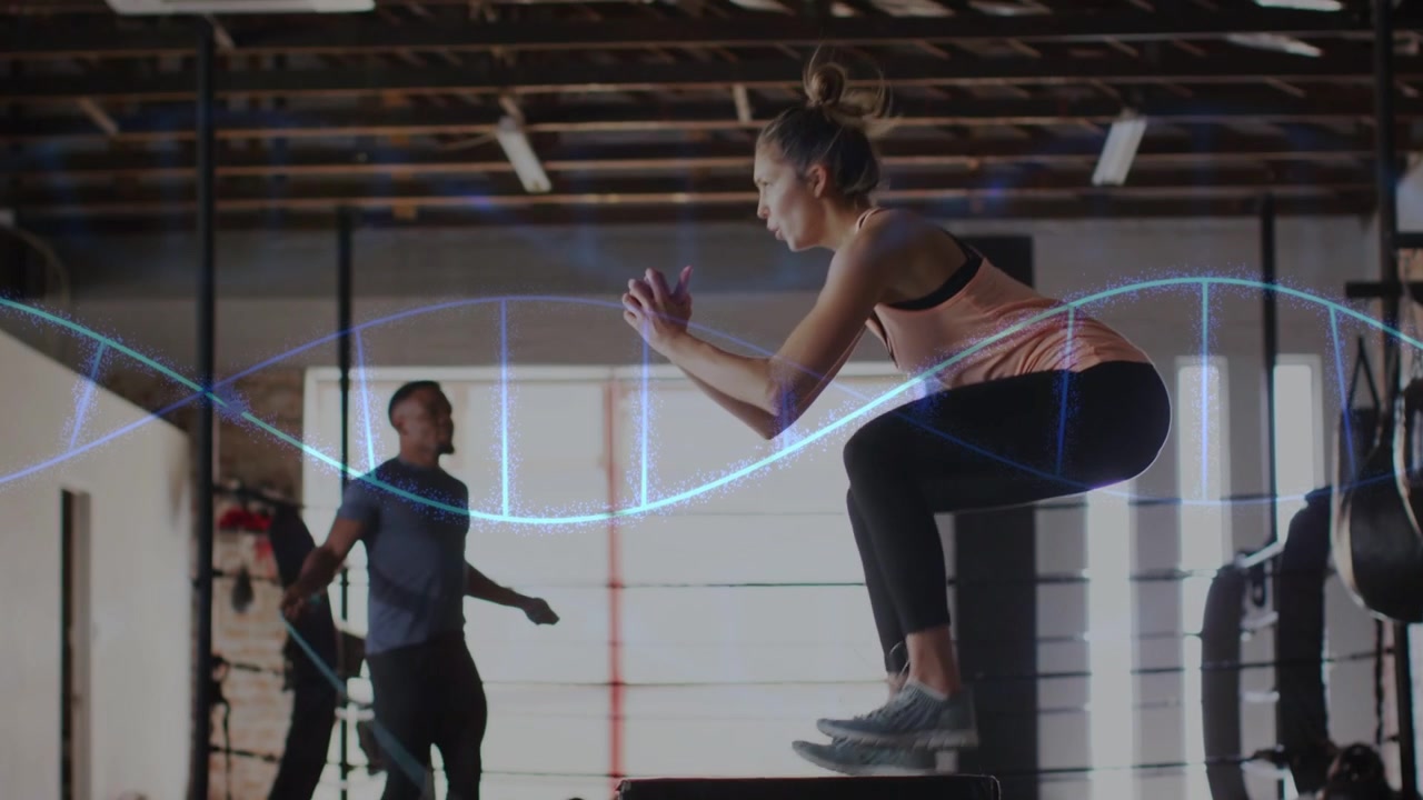 Woman doing repeated plyo box jumps in fitness gym for power, waveform sweeping cueing jump timing