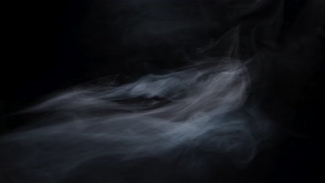 neblina de humo arremolinándose sobre un fondo negro 03