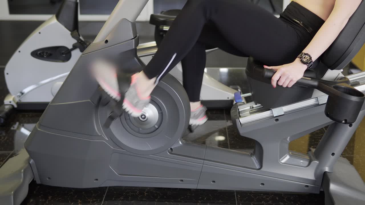 Woman working out on an exercise bike