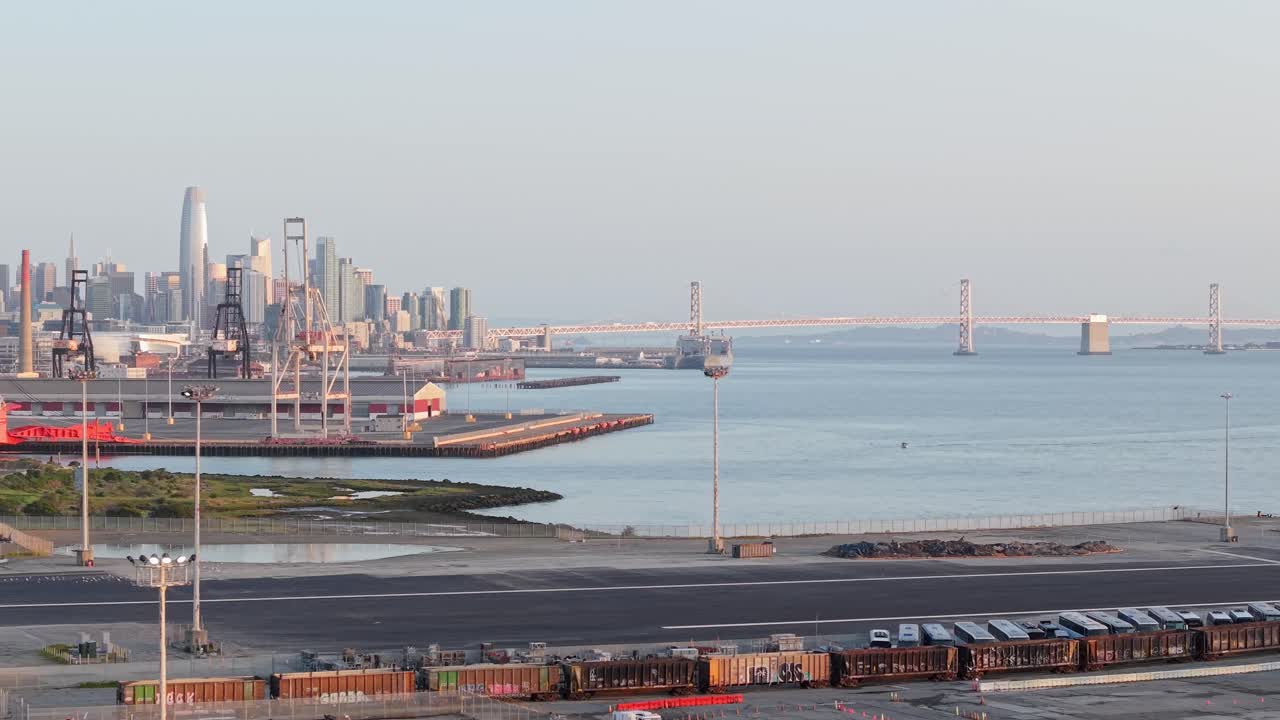 The Bay Bridge seen in the distance from aerial footage taken at Heron’s Head Park in San Francisco, California.