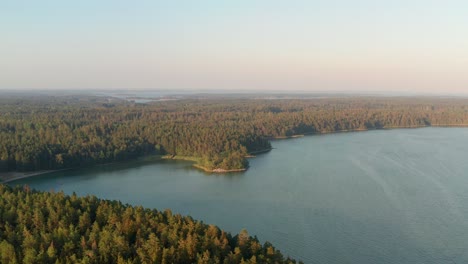 drone shot of rocky baltic sea coast in sweden during sunset