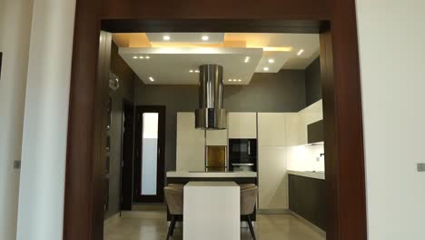 modern kitchen clean interior design with circular extractor fan