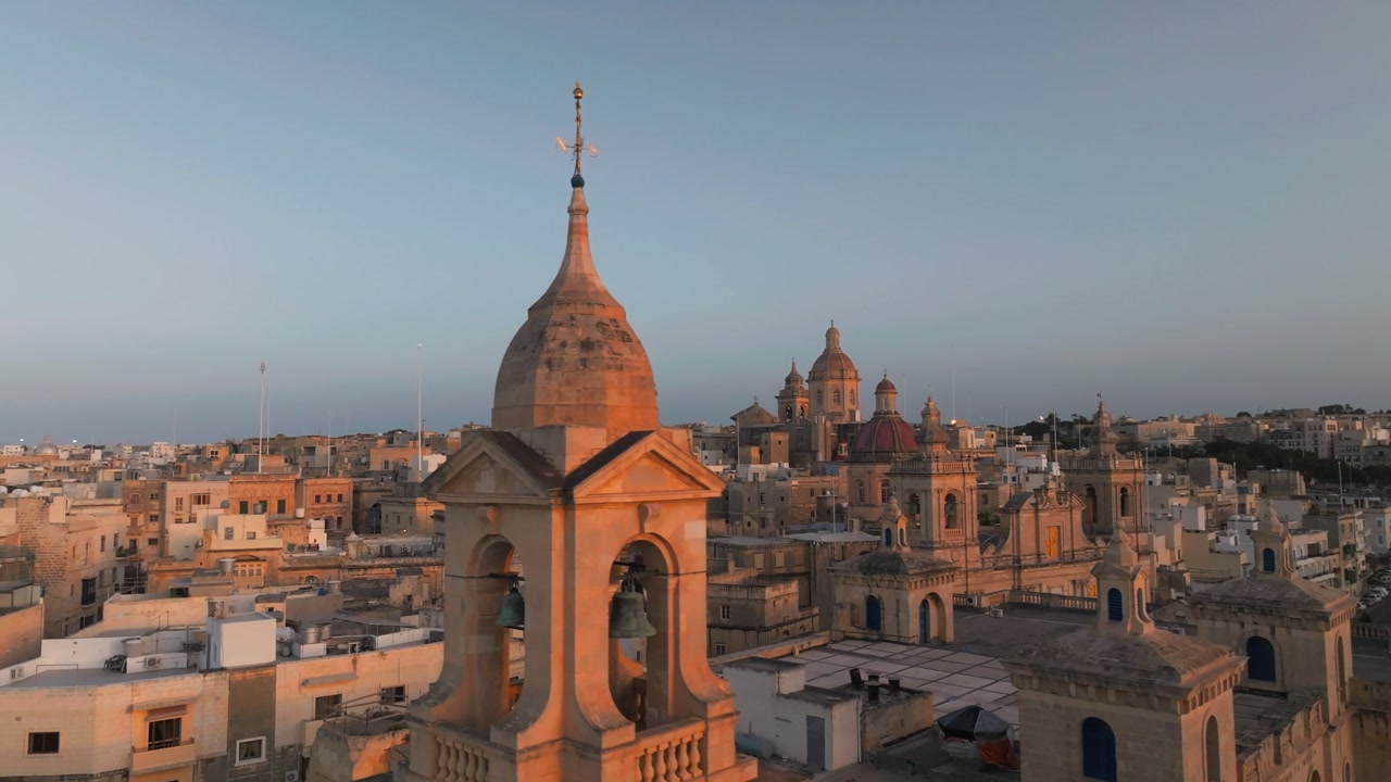 Bell Tower Of St. Paul's Cathedral In The Historic Fortified City Of Mdina, Malta. Aerial Shot