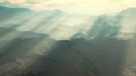 aerial vulcanic desert landscape with rays of light