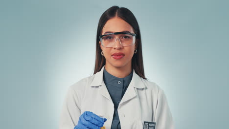 Doctor,-thumbs-up-and-sample-with-a-science-woman