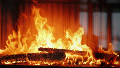 There\'s-Firewood-Burning-In-The-Fireplace-Beautiful-Flame-In-Modern-Fireplace