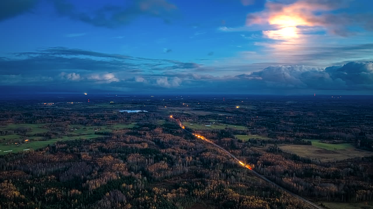Rural forest landscape autumn season foliage, aerial timelapse trains passing