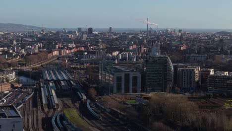 dublin city skyline with heuston train station, urban buildings, and coastal backdrop
