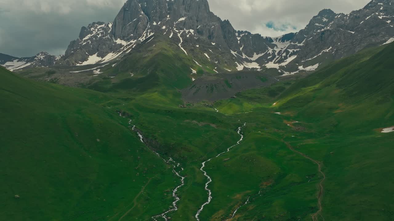 Aerial view of Juta Valley, lush greenery, winding river, tranquil landscape