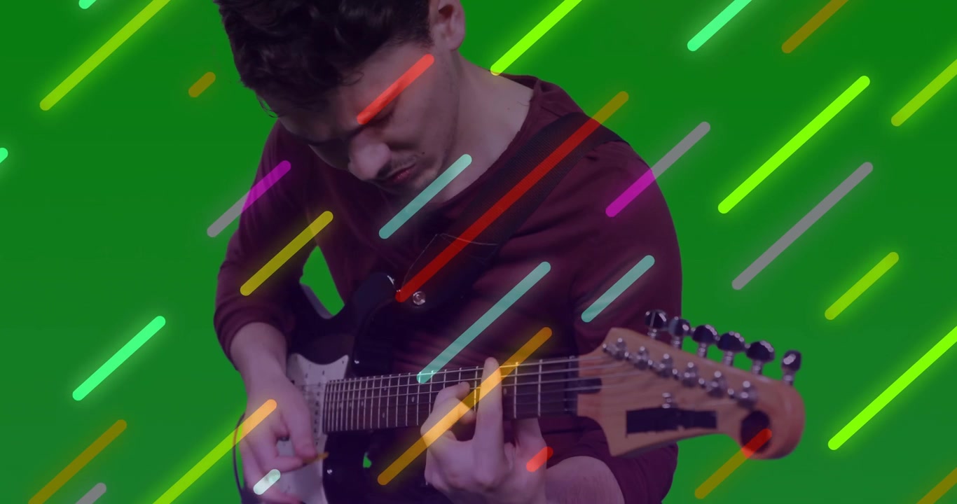 Chitarrista che avvia un riff, muovendo la mano per alternare picking e strumming sotto strisce al neon.