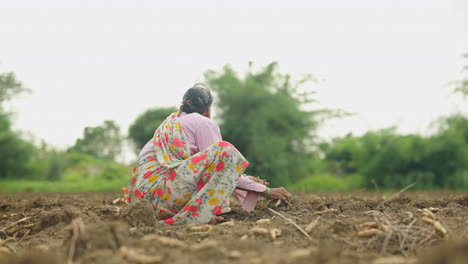 woman farming in rural field
