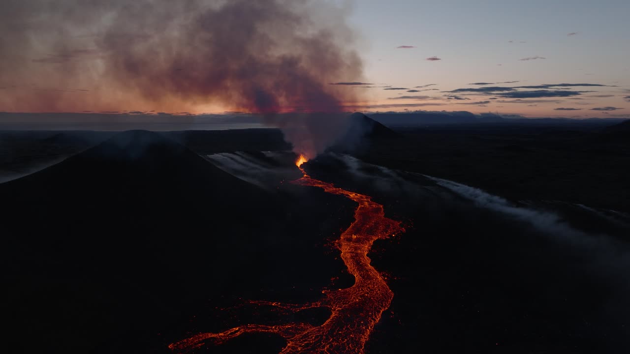 Aerial footage of new volcano eruption in Iceland, hot molten lava, Litli-Hr&uacute;tur