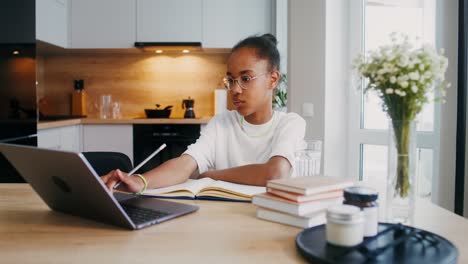 girl studying online at home