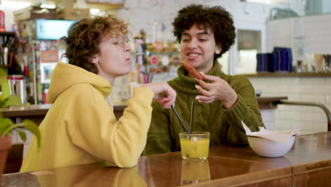 lesbian couple in a bar