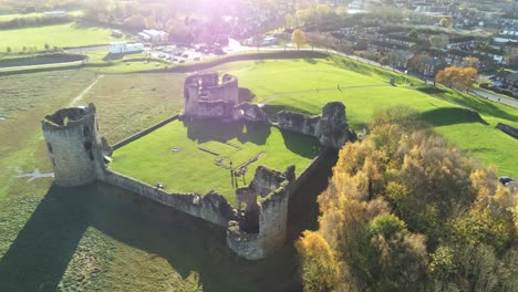 Historical-Flint-castle-medieval-military-ruins-landmark-aerial-view-left-orbit