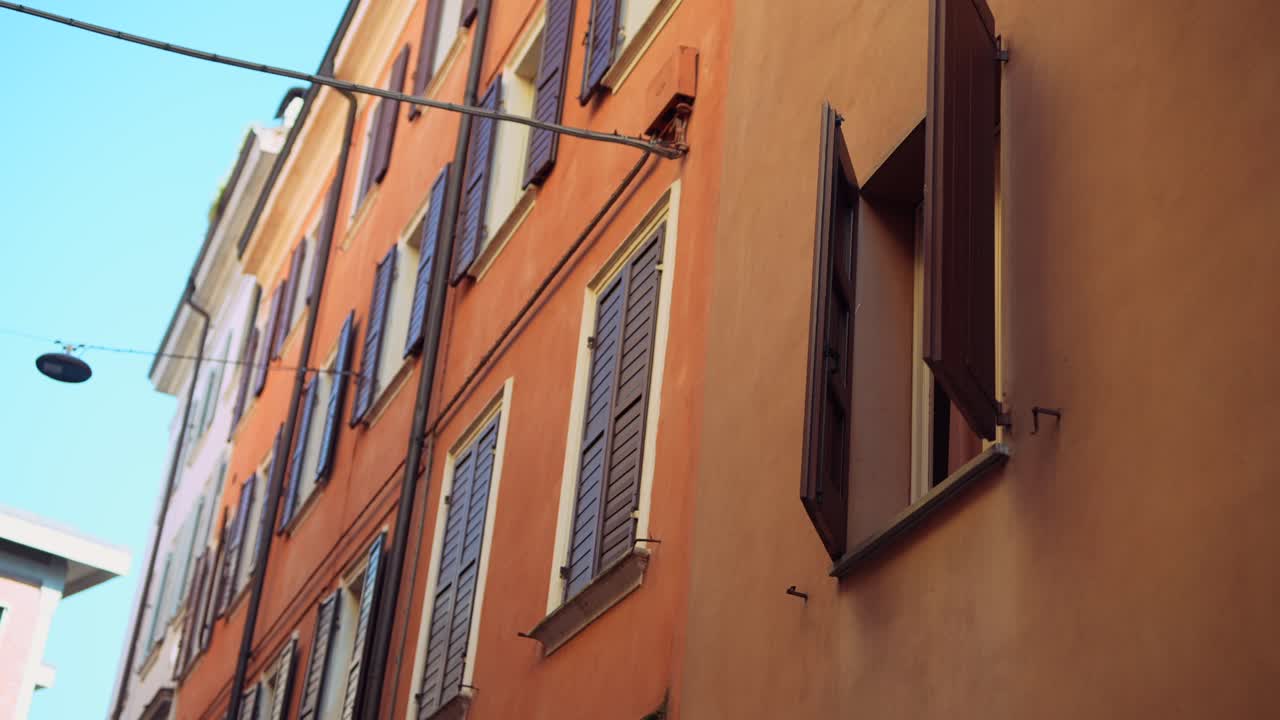 Italian Street Building with Brown Shutters