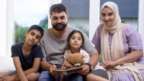 front view of islamic family in the living room.