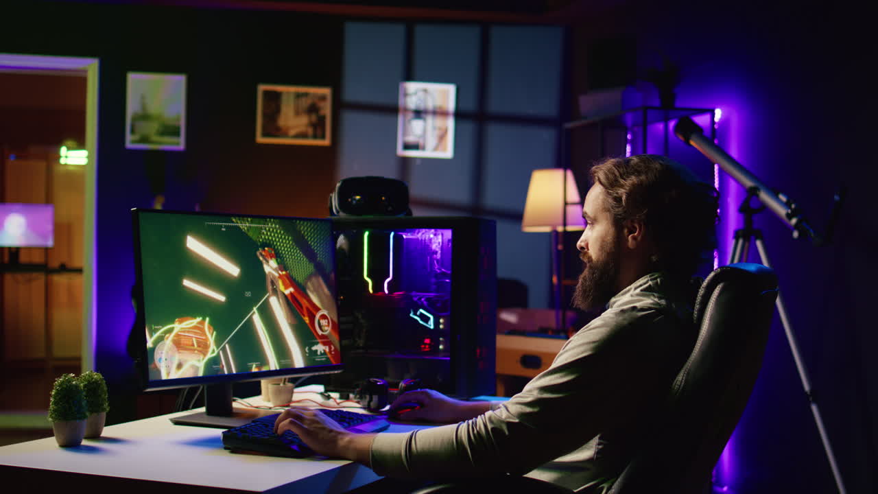 Man playing science fiction videogame on gaming PC, relaxing by shooting enemies