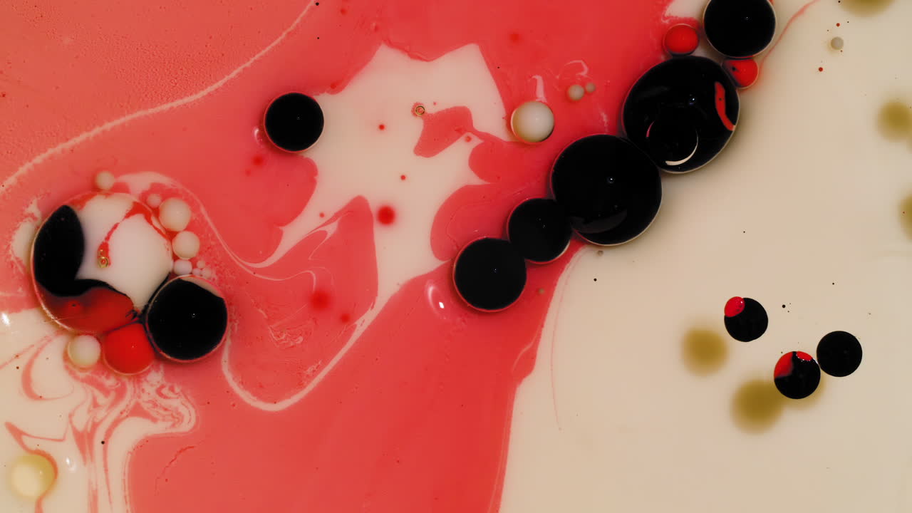 Red and cream colored acrylic paint mix, abstract fluid art background with Valentine's Day color scheme