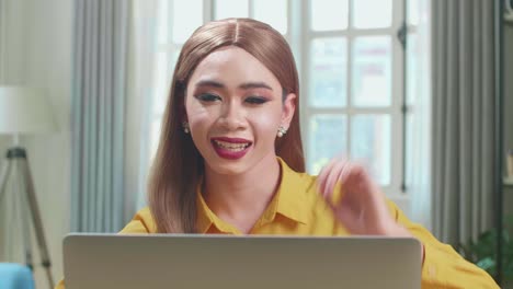 asian young transgender woman learning online or freelancer having video conference call at home