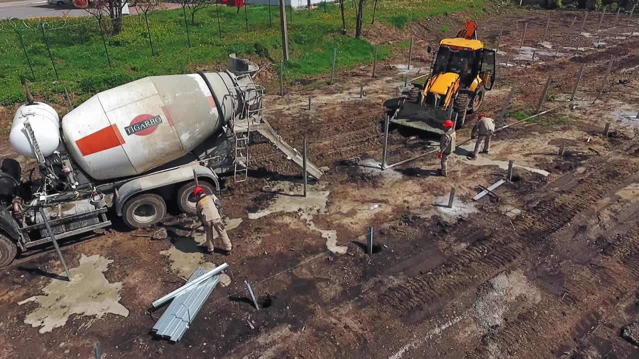 Machinery working at construction site. Aerial construction site with machinery