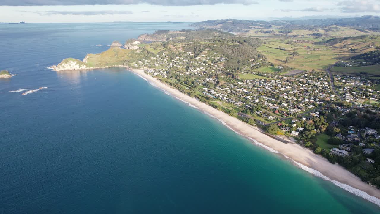 Aerial View of a Coastal Town and Beach