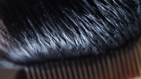 close-up of hair and comb